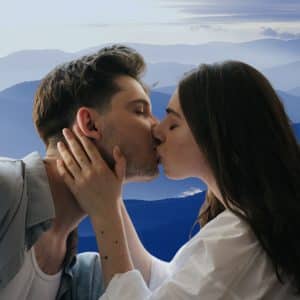 An image of a kissing man and woman, kissing is one of the methods used to make a man aroused and overcome erectile dysfunction by age.
