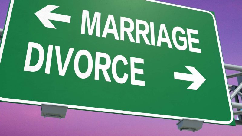 An image of a signpost pointing in two opposite directions, our experienced diviners offer both the divorce spell and marriage spell.