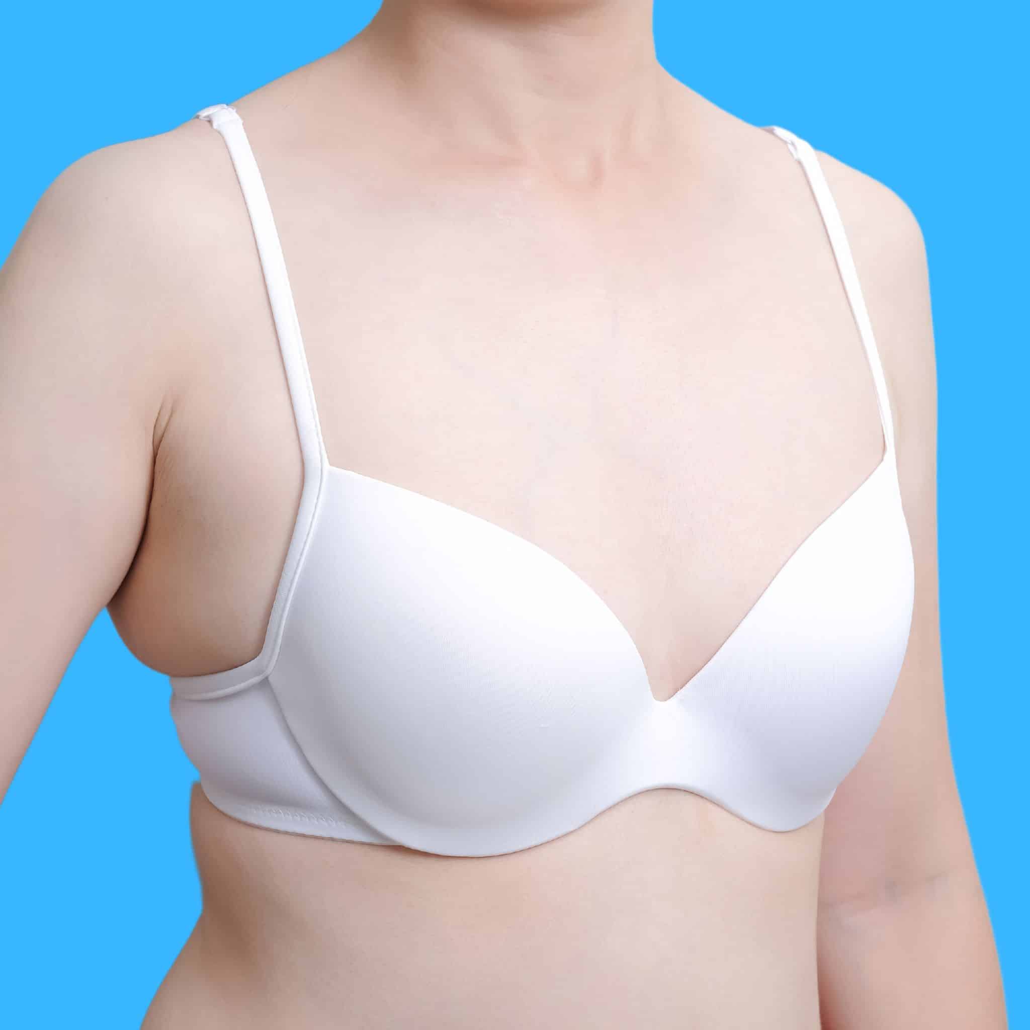 An image of a woman with small boobs before using our breast augmentation products.