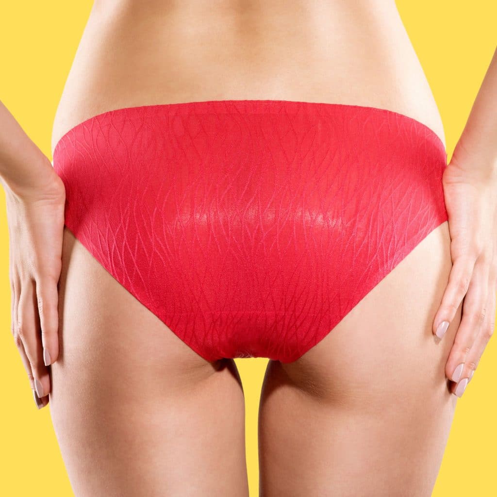 A woman displaying a lovely butt after using the cream for enhancing buttocks