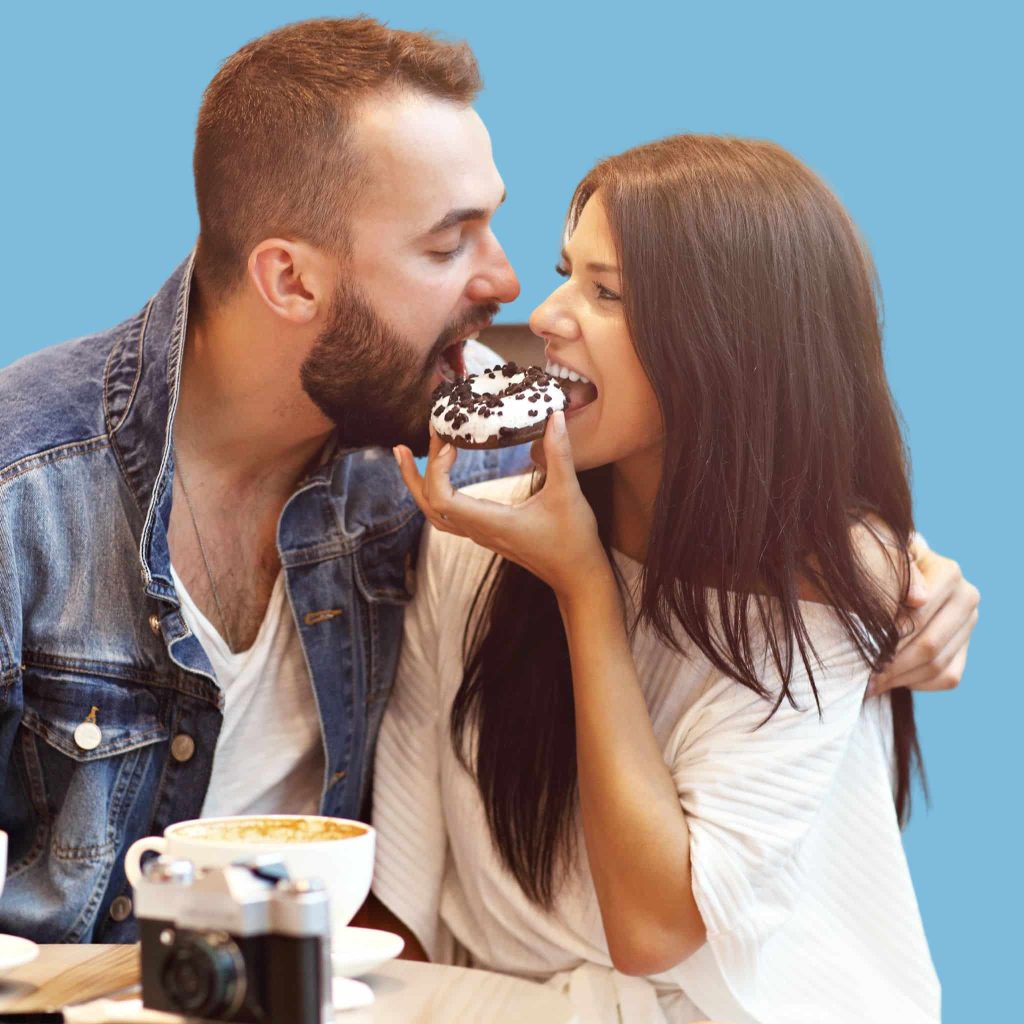 An image of a couple sharing a cake after using a return to love spell that reunited them